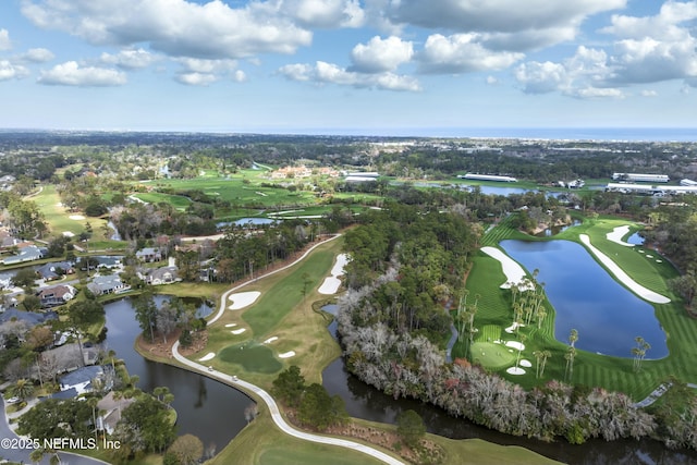 bird's eye view with a water view