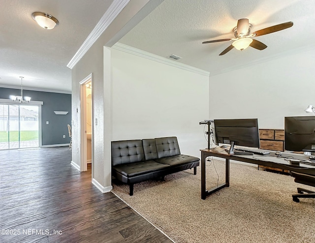 office with a textured ceiling, dark wood-type flooring, crown molding, and ceiling fan with notable chandelier