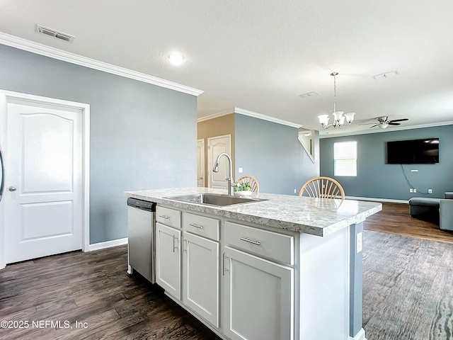 kitchen with dishwasher, white cabinetry, sink, hanging light fixtures, and a kitchen island with sink