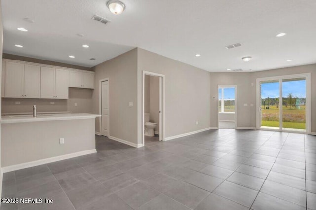 kitchen with white cabinetry