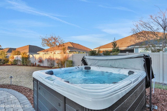 view of patio with a hot tub