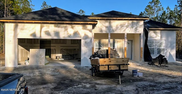 garage featuring driveway