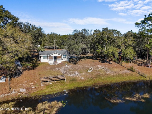 drone / aerial view featuring a water view