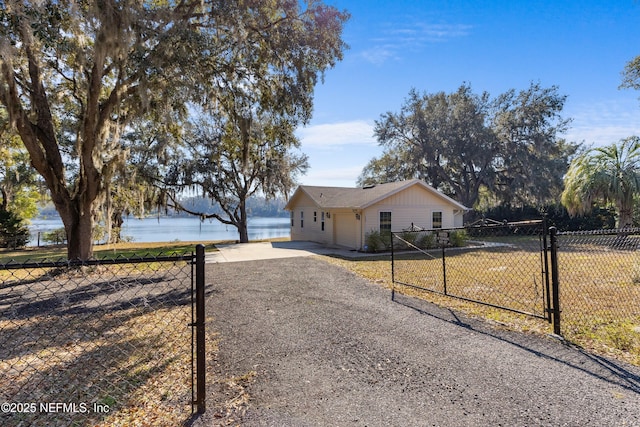 view of front of house featuring a water view