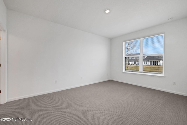 unfurnished room with carpet floors