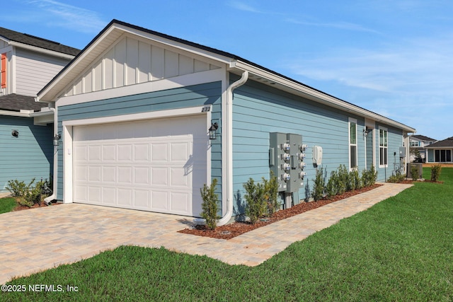 view of property exterior with a garage and a yard