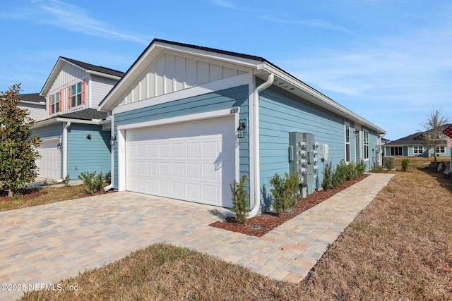 view of home's exterior featuring a garage and a lawn