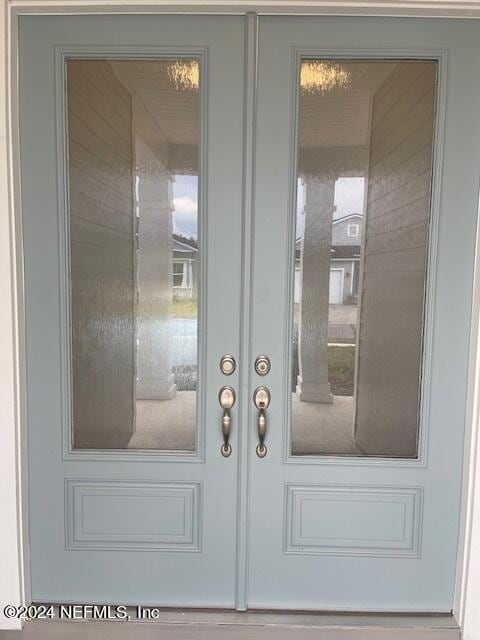 property entrance with french doors