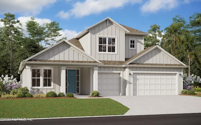 view of front of home featuring a front yard and a garage