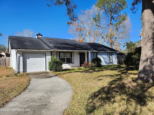 ranch-style home featuring a front yard and a garage