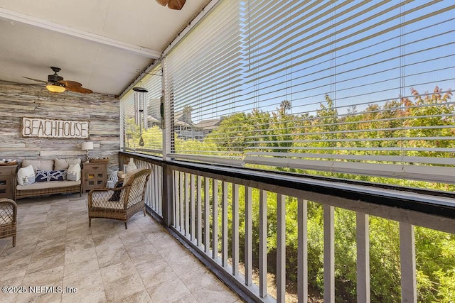 balcony featuring ceiling fan