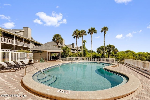 view of pool featuring a patio