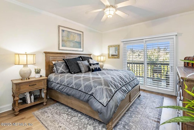 bedroom with ceiling fan, access to outside, crown molding, and hardwood / wood-style floors