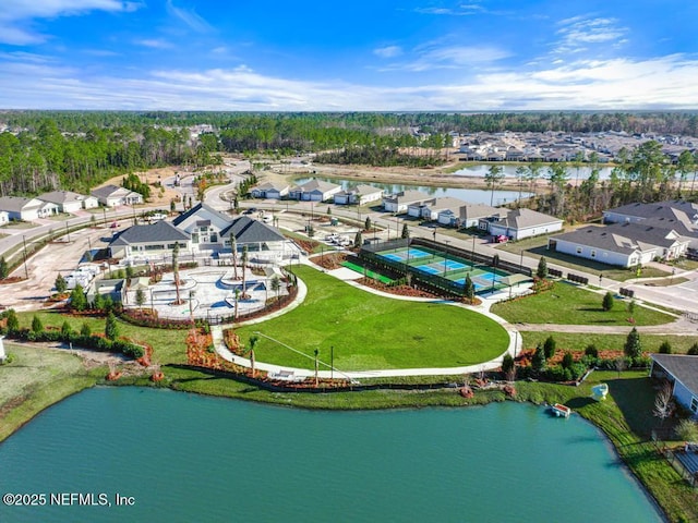 drone / aerial view with a water view