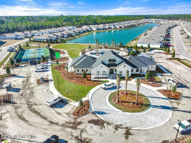 bird's eye view with a water view