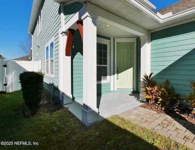 view of property exterior with a porch