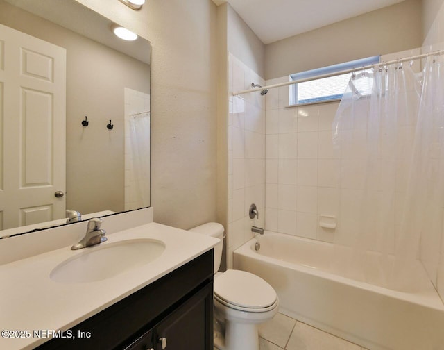 full bathroom with tile patterned flooring, shower / bath combination with curtain, vanity, and toilet