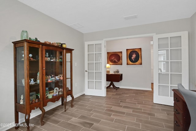 living area featuring french doors