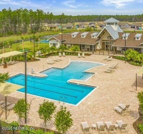 view of pool featuring a patio area