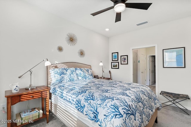 bedroom featuring ceiling fan and carpet