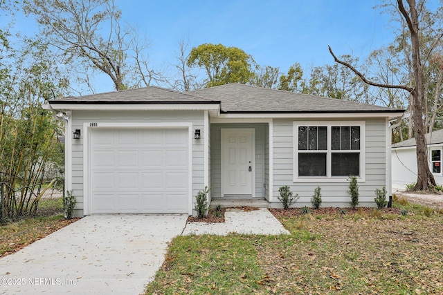 single story home featuring a garage