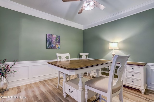 office space with ceiling fan, light hardwood / wood-style floors, and ornamental molding