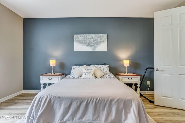 bedroom featuring light hardwood / wood-style flooring