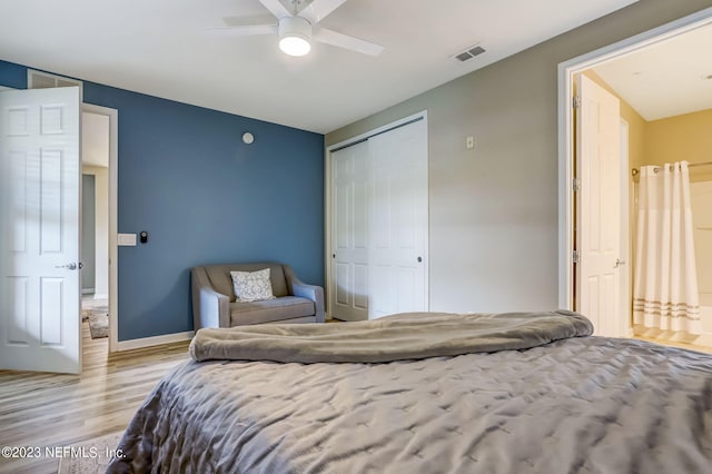 bedroom with ceiling fan and light hardwood / wood-style floors