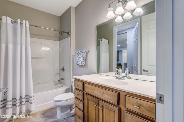 full bathroom featuring toilet, vanity, tile patterned flooring, an inviting chandelier, and shower / tub combo with curtain