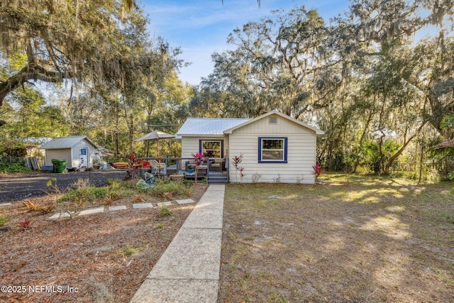 view of front of house featuring a deck