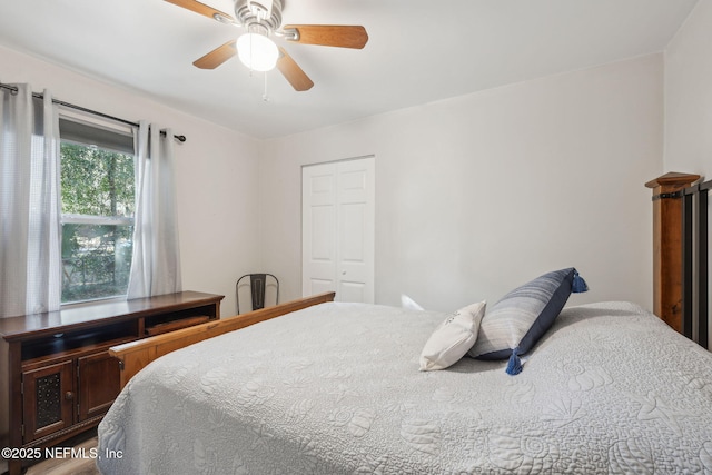 bedroom with a closet and ceiling fan