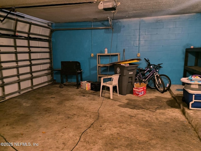 garage featuring a garage door opener