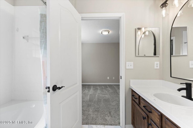 bathroom with shower / bathing tub combination and vanity