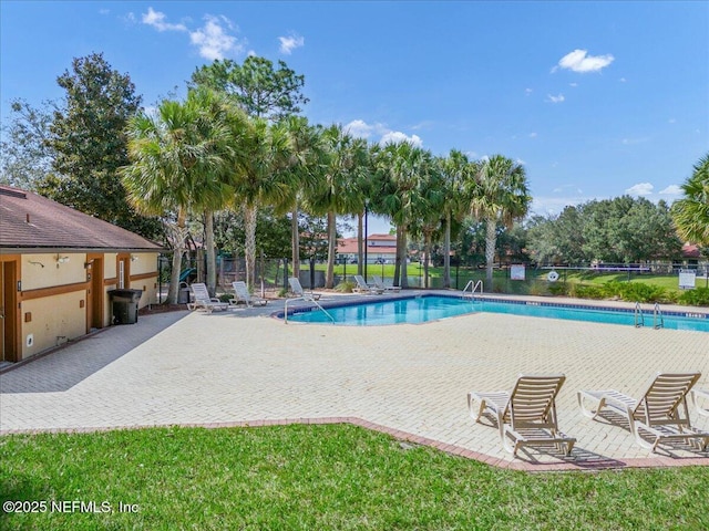 view of pool featuring a patio