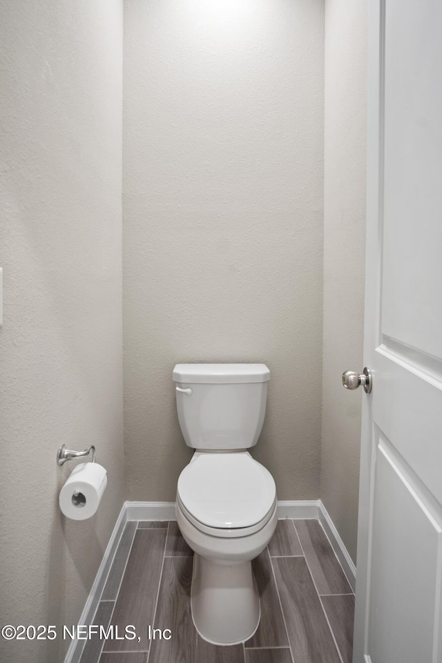 bathroom featuring toilet