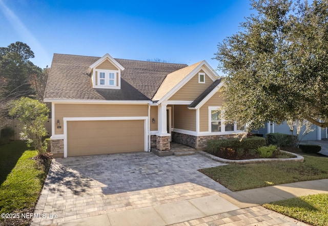 view of front of home featuring a garage