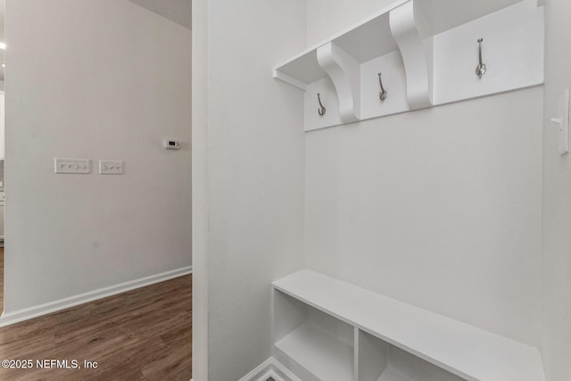 mudroom with dark hardwood / wood-style flooring