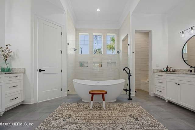 264 N Roscoe Blvd, Palm Valley, FL 32082 - bathroom featuring ornamental molding, vanity, and a tub
