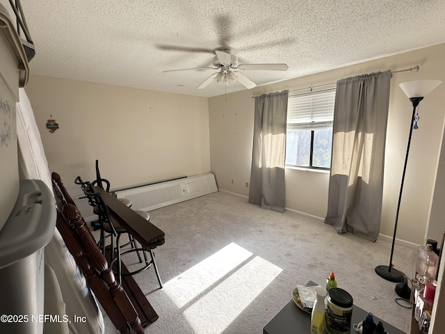 7020 Prestwick Cir N, Jacksonville, FL 32244 - interior space featuring baseboards, a textured ceiling, ceiling fan, and carpet flooring
