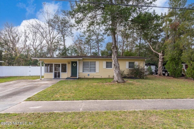 single story home featuring a front yard