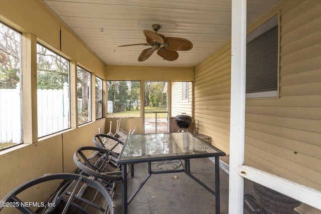 sunroom / solarium with ceiling fan