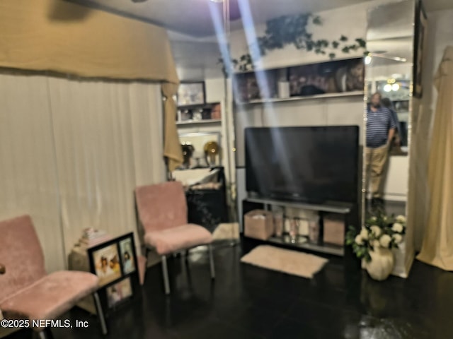 living room featuring ceiling fan