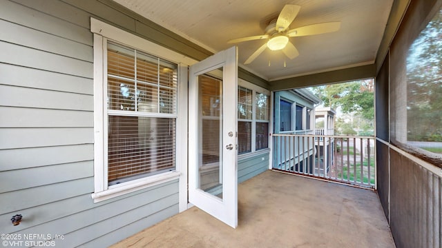 exterior space featuring ceiling fan and a porch