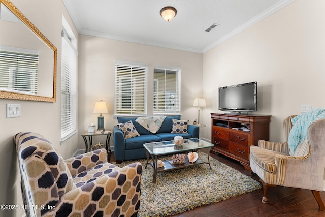 living room featuring crown molding and wood-type flooring