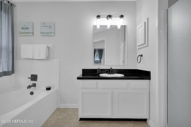 bathroom with shower with separate bathtub, vanity, and tile patterned floors