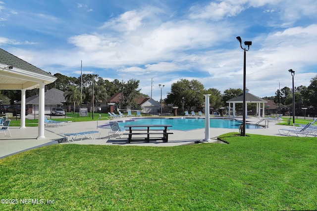 view of pool with a gazebo, a yard, and a patio