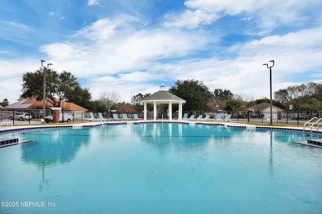 view of swimming pool with a gazebo