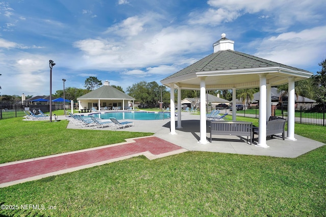 view of swimming pool with a gazebo, a patio area, and a lawn