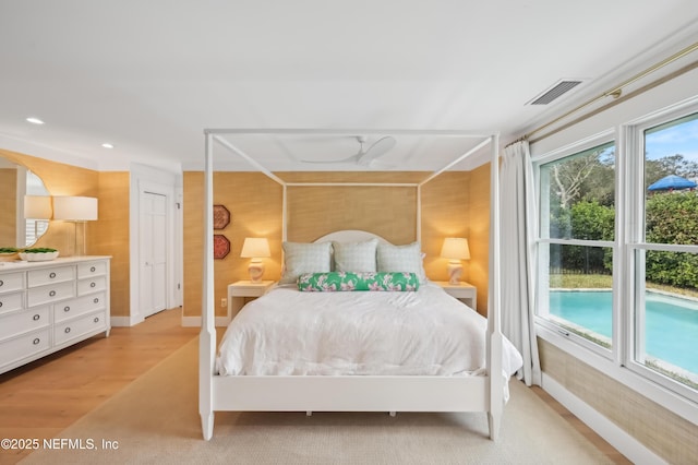 bedroom with light wood-type flooring