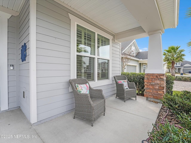 view of patio featuring covered porch